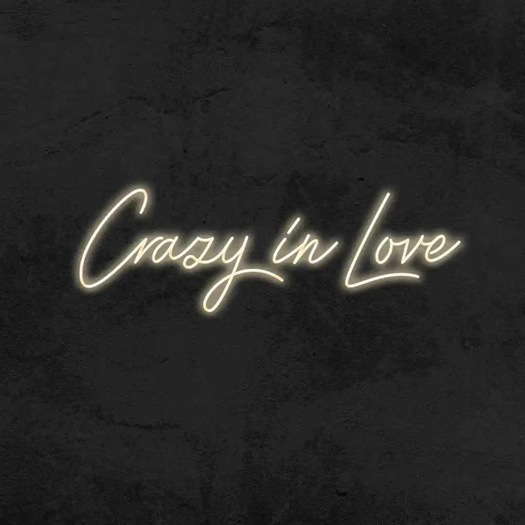 Crazy in Love Wedding Neon Sign - A vibrant and enchanting declaration of deep affection, ideal for adding a touch of romance to any wedding celebration - from manhattonneons.com